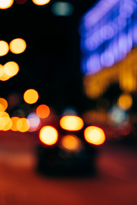 close up view of colorful bokeh night city lights on dark background