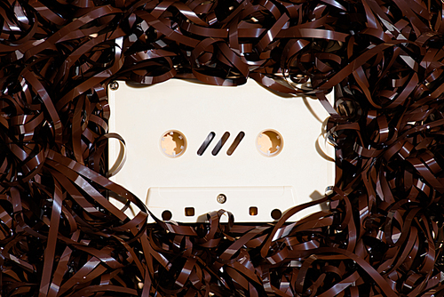 top view of arranged retro audio cassette with tape