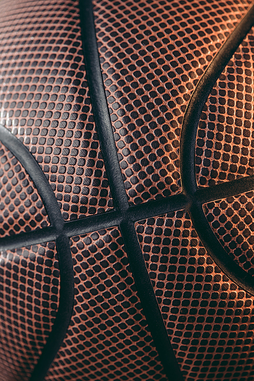 close up of leather brown basketball ball