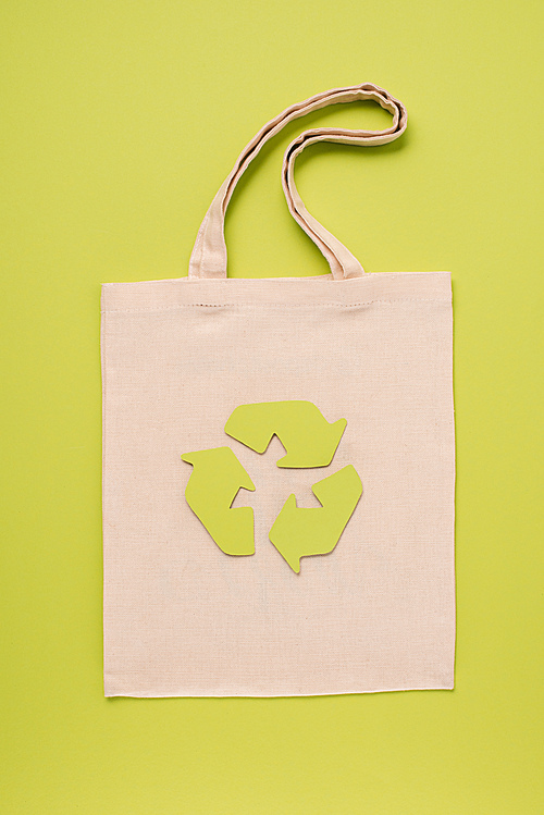 Tissue bag with recycle sign on yellow background