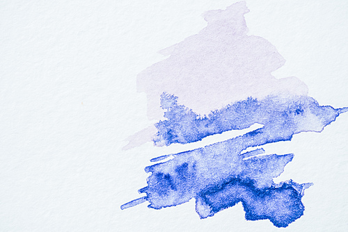 abstract blue watercolor painting on white paper