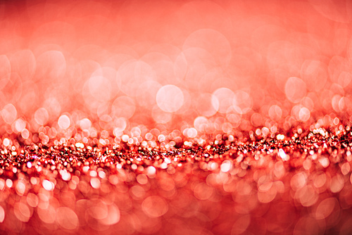 abstract christmas background with red glitter and bokeh