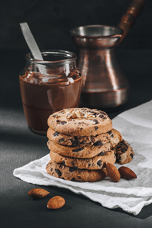 delicious chocolate-chip cookies with jar of chocolate mousse and jezve
