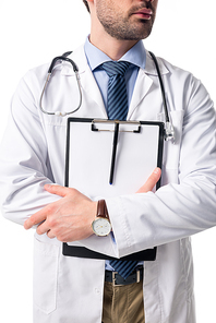 Close-up view of blank clipboard in hands of doctor wearing white coat with stethoscope isolated on white