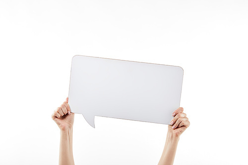 cropped view of woman with speech bubble in hands isolated on white