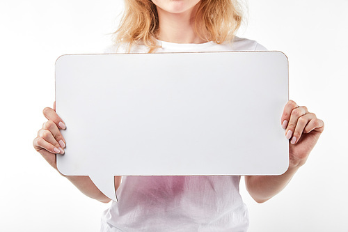 cropped view of woman with speech bubble in hands isolated on white