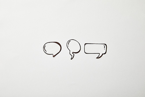 thought and speech bubbles on white surface