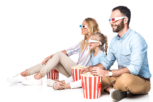 family with popcorn watching movie isolated on white