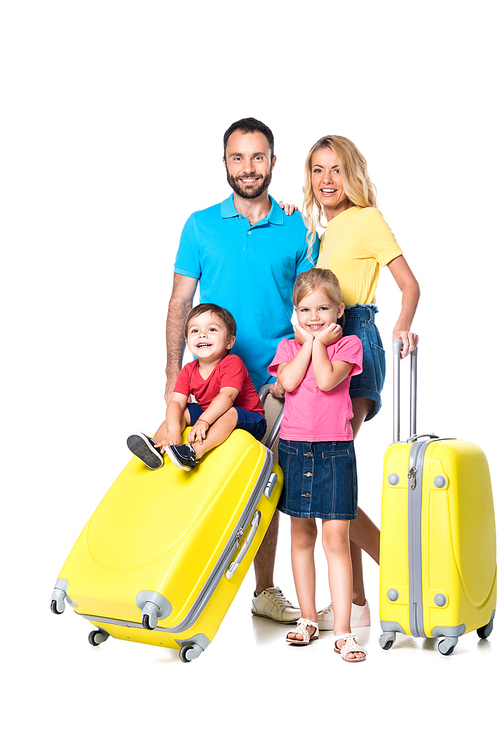 family with yellow travel bags isolated on white