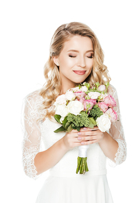 smiling young bride with bridal bouquet isolated on white