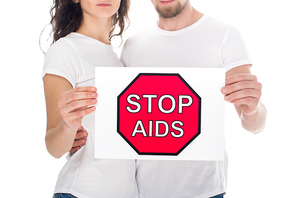cropped shot of couple with stop aids placard isolated on white