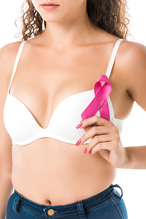 cropped shot of young woman in bra holding pink ribbon, breast cancer awareness concept