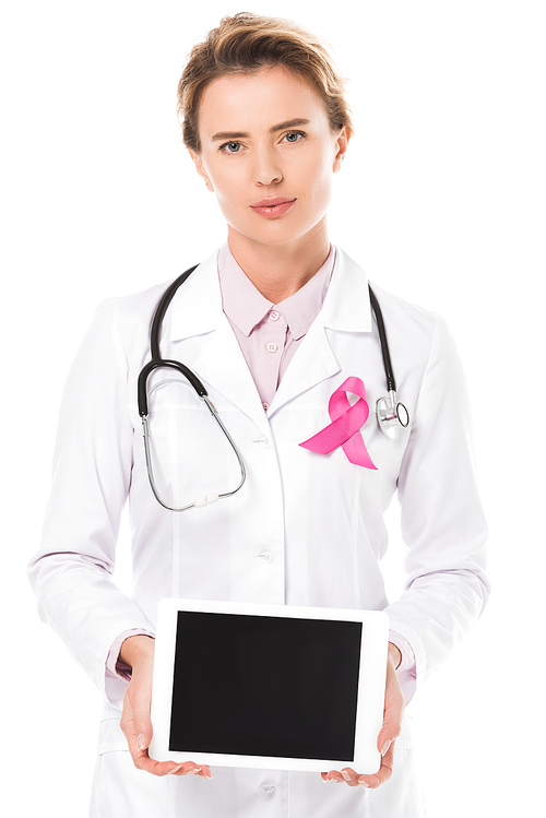 doctor with pink ribbon holding digital tablet with blank screen and  isolated on white, breast cancer awareness concept