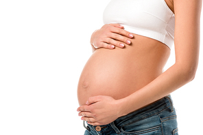 partial view of pregnant woman touching her belly isolated on white