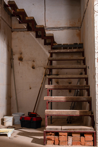staircase in grungy house during renovation