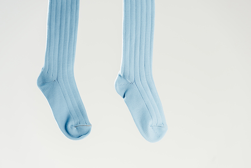 pair of blue cotton socks isolated on grey