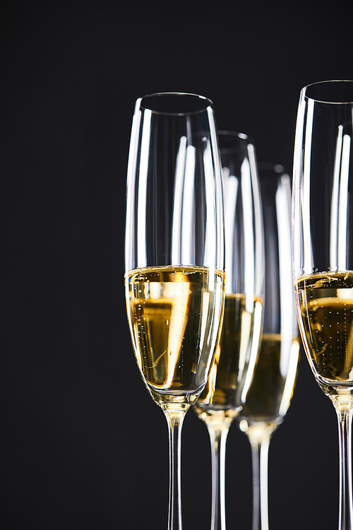 glasses of champagne for celebrating christmas, isolated on black