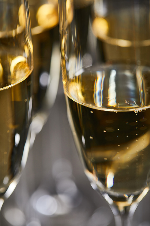 close up of sparkling wine in glasses for celebrating christmas eve