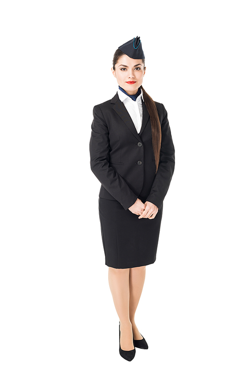 Smiling young stewardess isolated on white