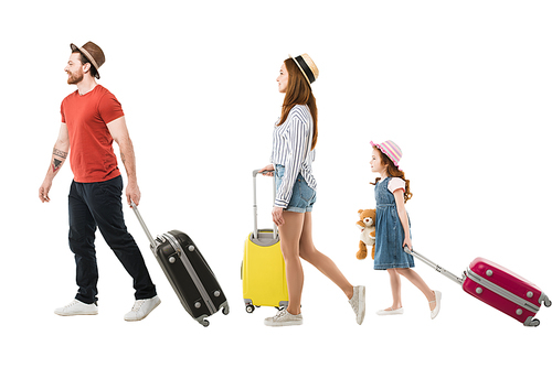 Stylish family of tourists carrying suitcases isolated on white, travel concept