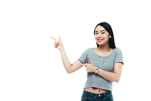 happy asian girl pointing with fingers isolated on white
