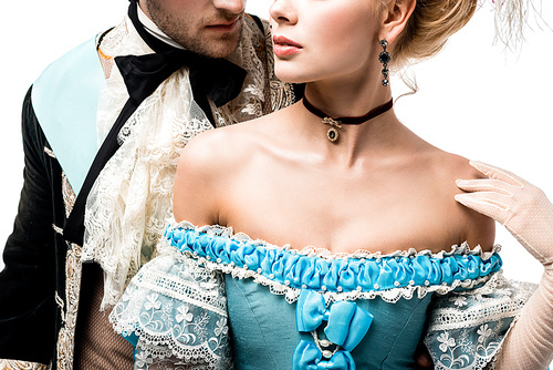 cropped view of pompous victorian man near young woman in blue dress isolated on white
