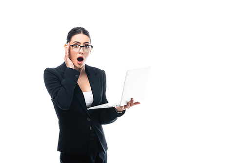 shocked businesswoman holding laptop while  isolated on white