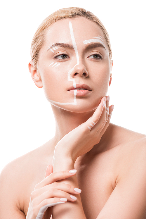 유토이미지 attractive woman with white lines on face looking away isolated