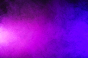 abstract pink and purple smoke on dark background