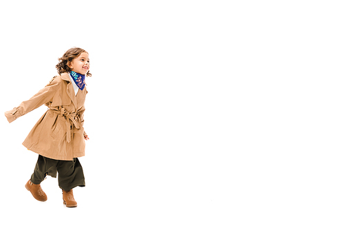 beautiful little child in trench coat running isolated on white