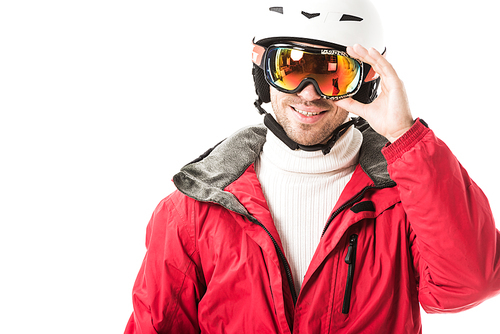 adult man in red ski jacket and helmet putting on goggles and smiling isolated on white