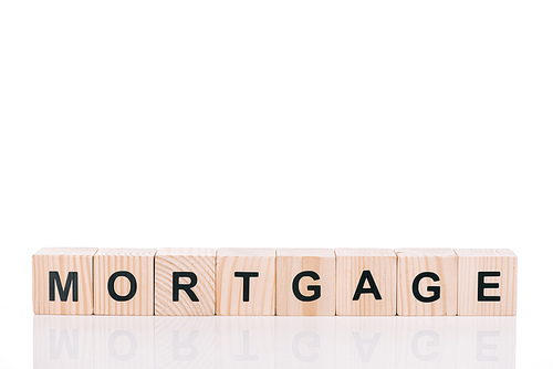 wooden blocks with mortgage lettering isolated on white