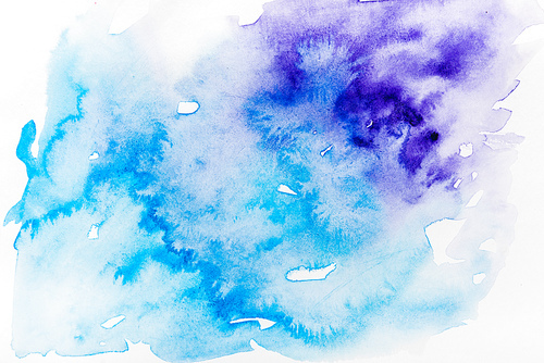 top view of blue and purple spills on white paper