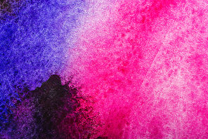 top view of pink and purple watercolor spills with copy space