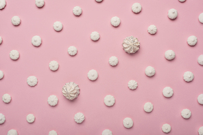 pattern with white marshmallows, isolated on pink