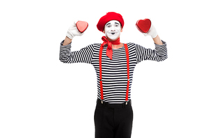 smiling mime holding heart shaped gift boxes isolated on white, st valentines day concept
