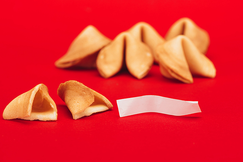 traditional chinese fortune cookies on red surface| Chinese New Year concept