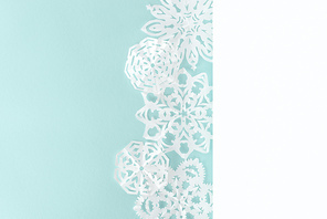 decorative christmas snowflakes| isolated on light blue with copy space