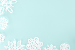 decorative christmas snowflakes| isolated on light blue with copy space