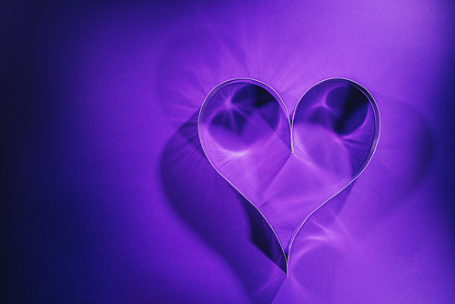 top view of paper heart on purple| valentines day concept