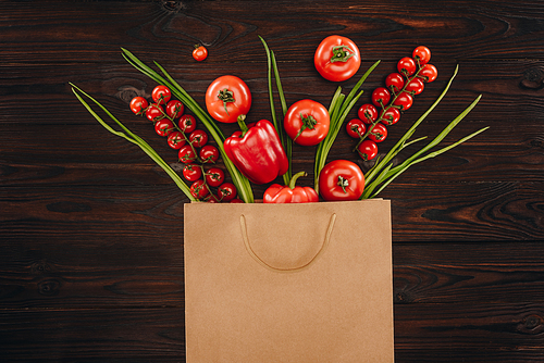 top view of different red vegetables in shopping bag| grocery concept