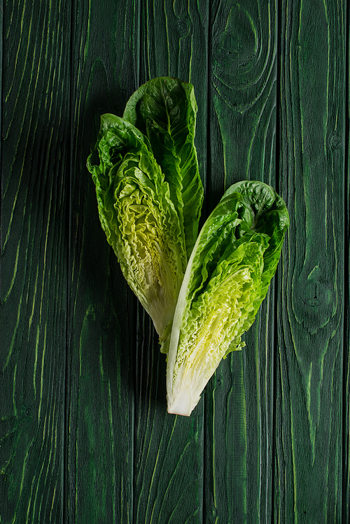 top view of cut green cabbage on wooden table| healthy eating concept