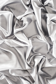 crumpled silver silk fabric background