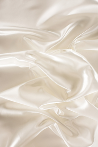 ivory crumpled shiny silk fabric background