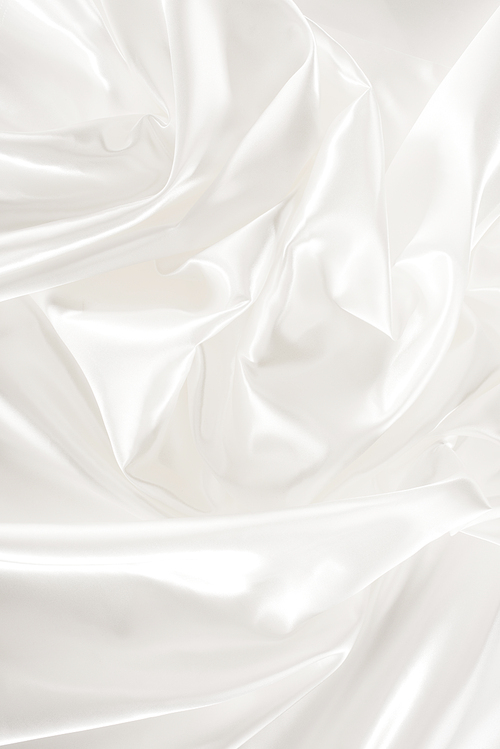 white crumpled shiny silk fabric background