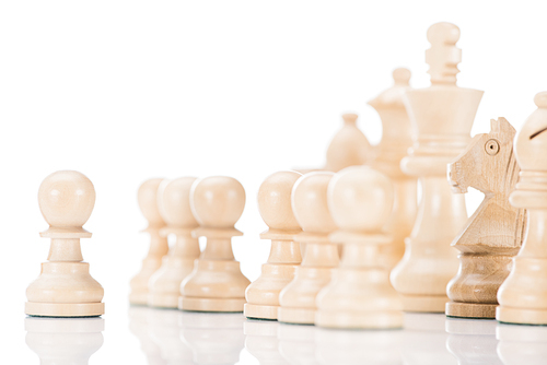 white wooden chess figures on white