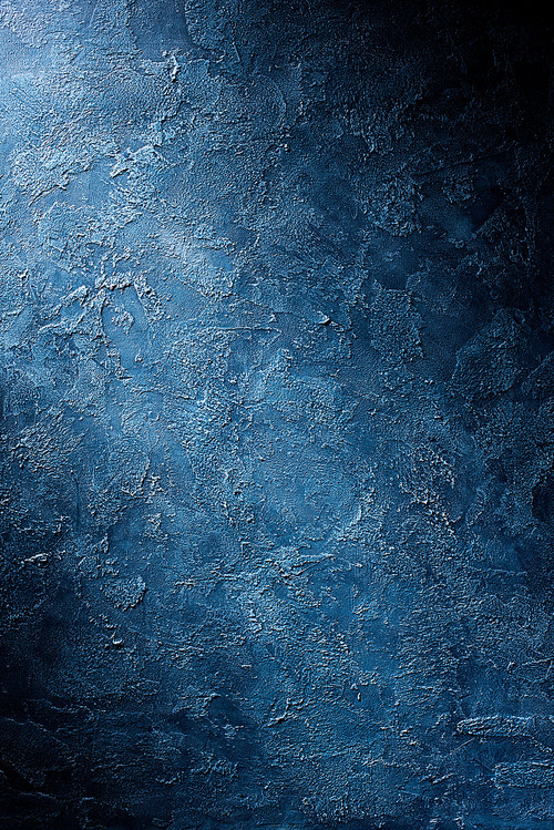 Rough textured blue wall background