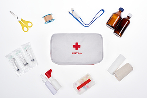 flat lay with automotive first aid kit with various medicines isolated on white