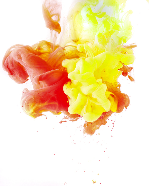 smoky background with yellow and red paint, isolated on white