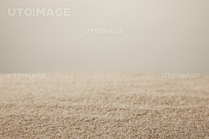 유토이미지 | close up view of sand texture on grey backdrop